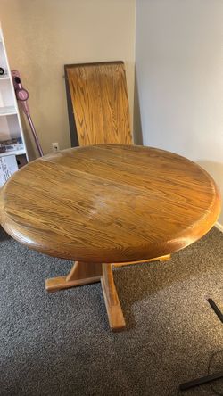 wooden dining table with leaf insert