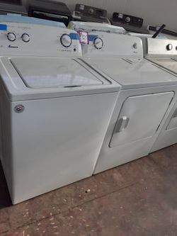 Amana top load washer and dryer set working perfectly with 4 months warranty
