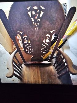 Antique Handcrafted Carved Rocking Chair