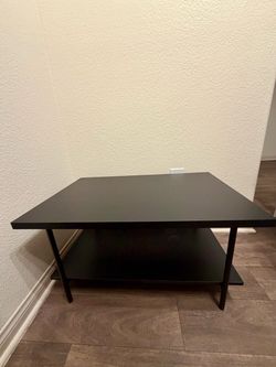 Black wooden and metal table