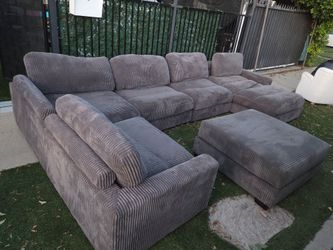 Large Gray Corduroy Sectional Sofa with Ottoman