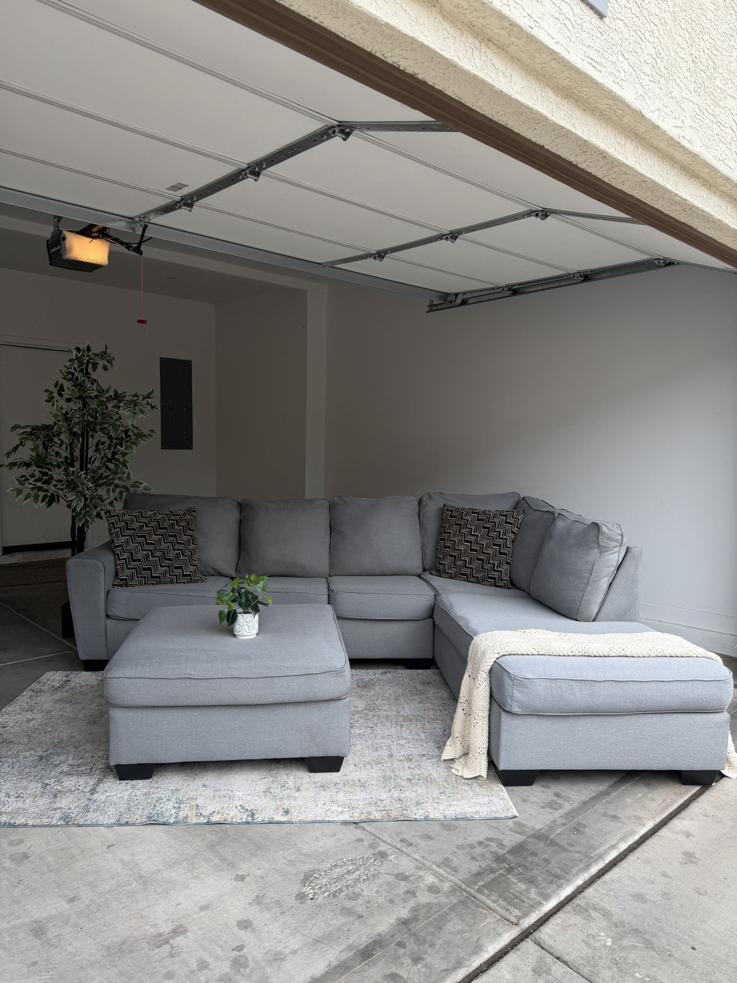Gray Sectional With Ottoman