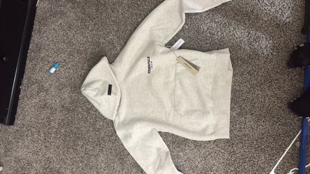 essentials light oat hoodie