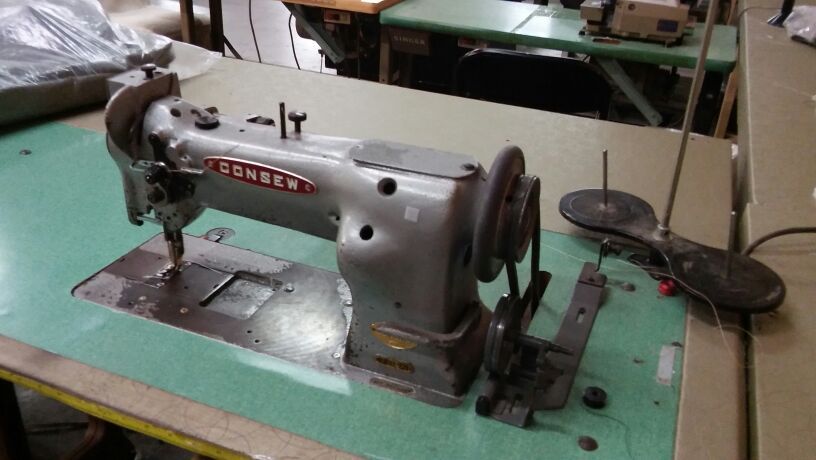 I HAVE CONSEW SEWIN MACHINE. W REVERSE.
