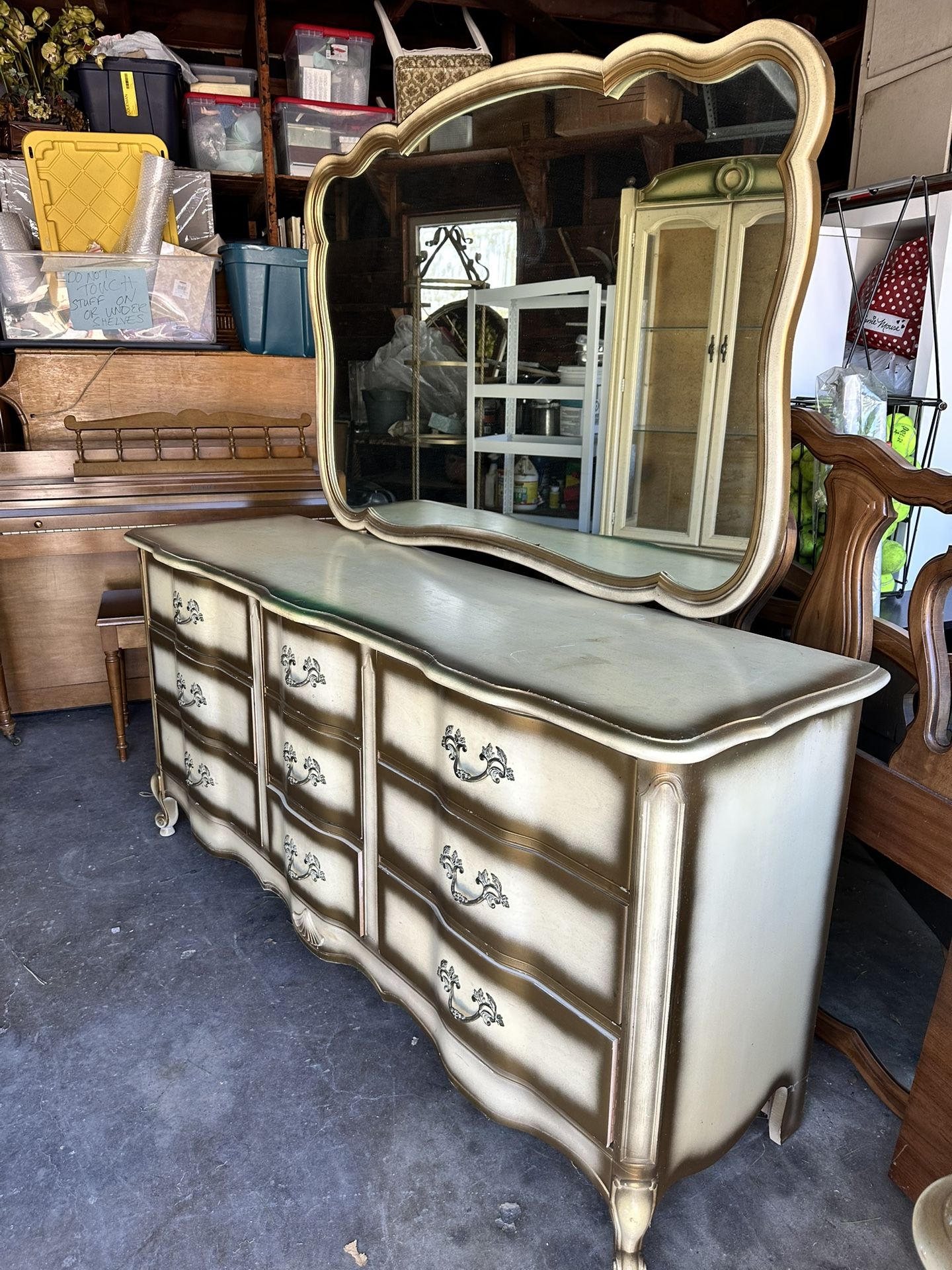 French Style Dresser with an attached mirror.