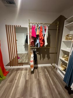 Gold industrial clothing racks
