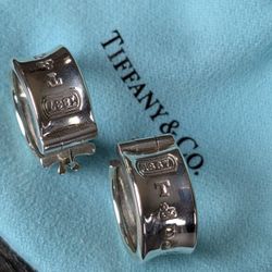 Sterling silver hoop earrings with “Tiffany & Co.