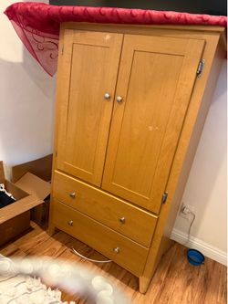 Two piece armoire dresser set