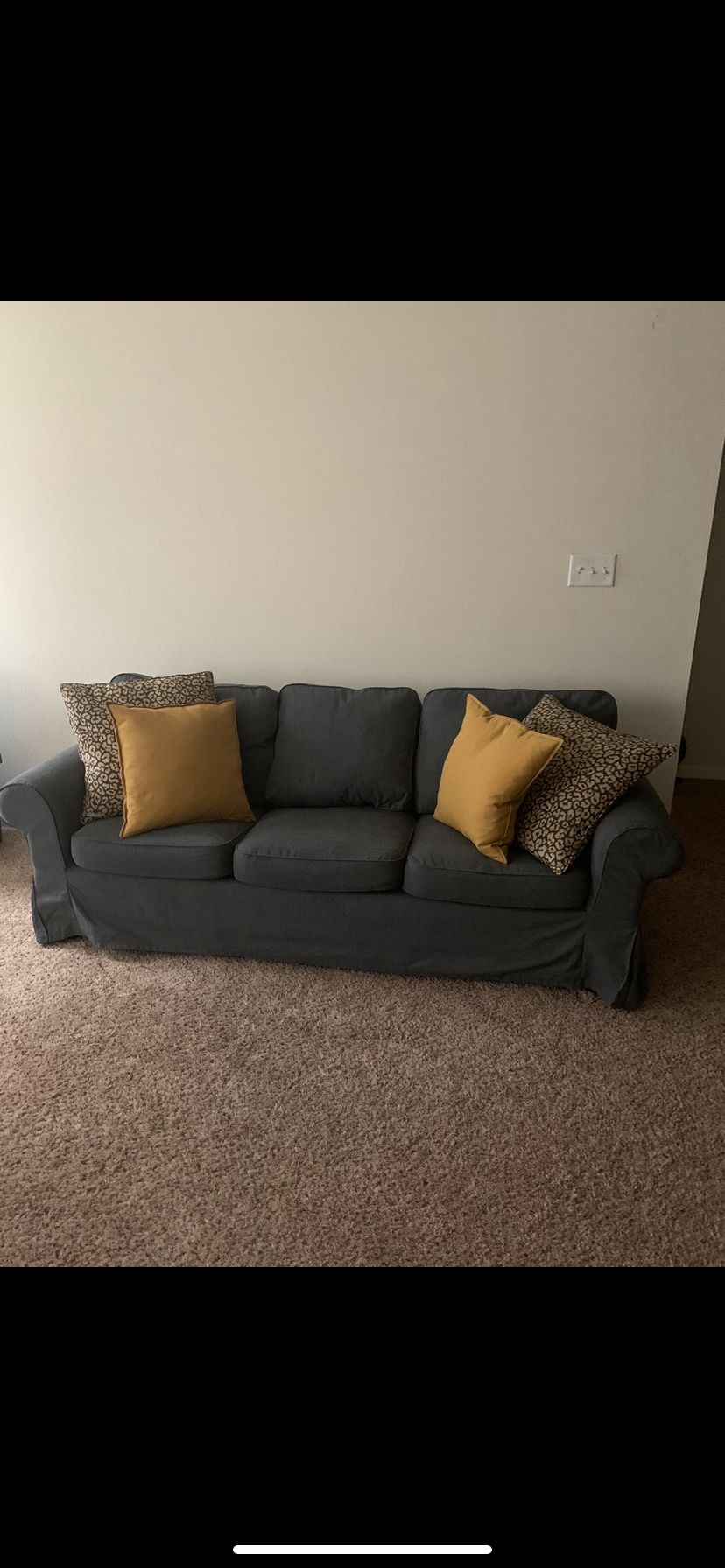 Couch w/convenient outlet table