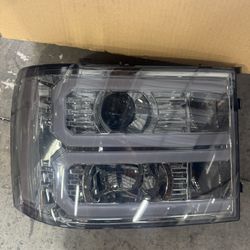 07-13 GMC Sierra Headlights