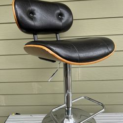 One Bar stool, swivel and adjustable seat height.