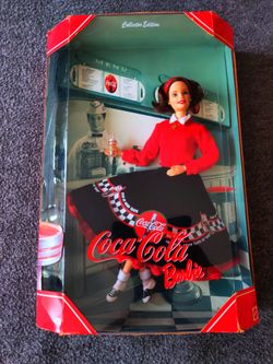 3 Coca-Cola Barbie dolls