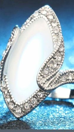 L TWIST OPAL LADIES RING STAMPED 925 STERLING SILVER RING. SIZE 61/2 & 7