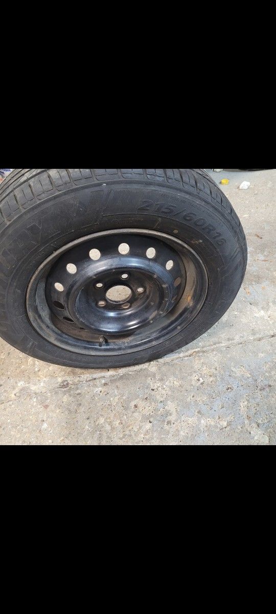 215 60R16 TIRE WITH 5X4.5 RIM