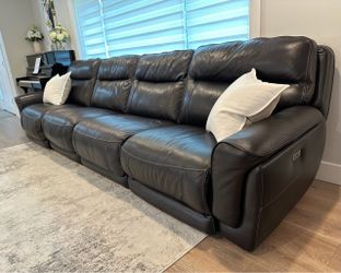 Leather sofa with recliners