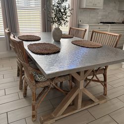 Bernhardt stainless steel dining table with four chairs