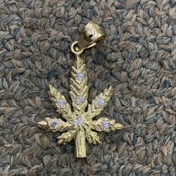 10k Sold Gold Diamond Leaf Pendant