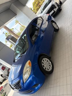 Nissan Versa Blue 4-Door Sedan