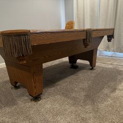 Solid Pool Table – $150  (Must Pick Up)