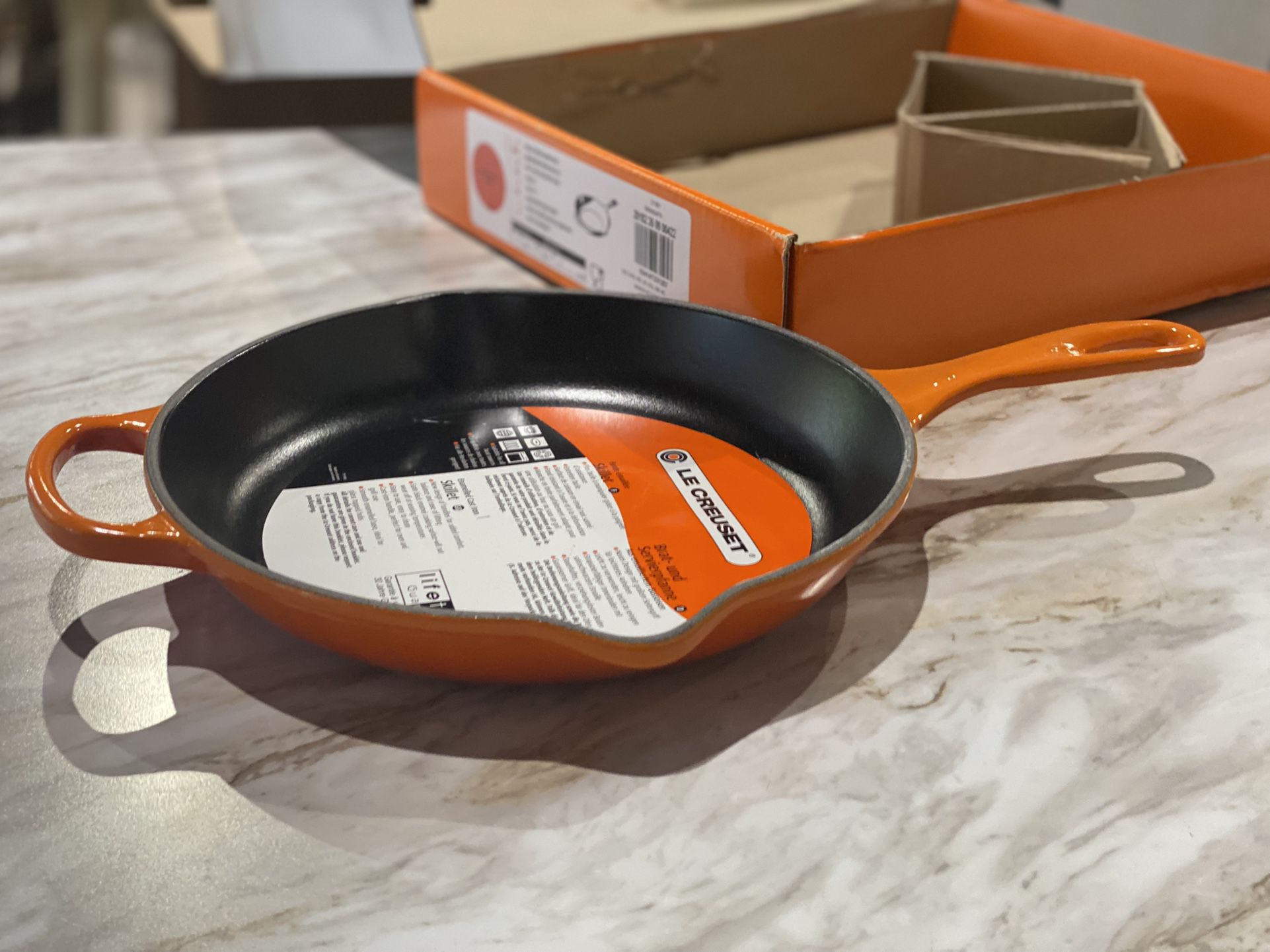 Le Creuset Enameled Cast Iron Signature Iron Handle Skillet, 10.25" (1-3/4 qt.), Flame. Made in France. MSRP $189. Our price $123 + sales tax  
