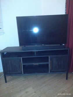 Dark Wood TV credenza with Cabinet Doors