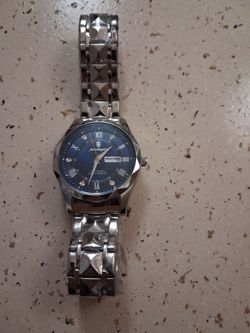 Poedagar Silver Stainless Steel Watch$30 cash