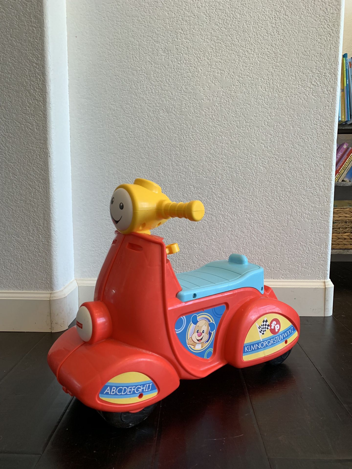 Fisher price musical scooter