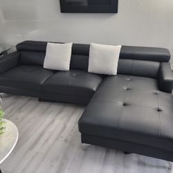 FURNITURE- BRAND NEW BLACK COUCH AND CHAIR
