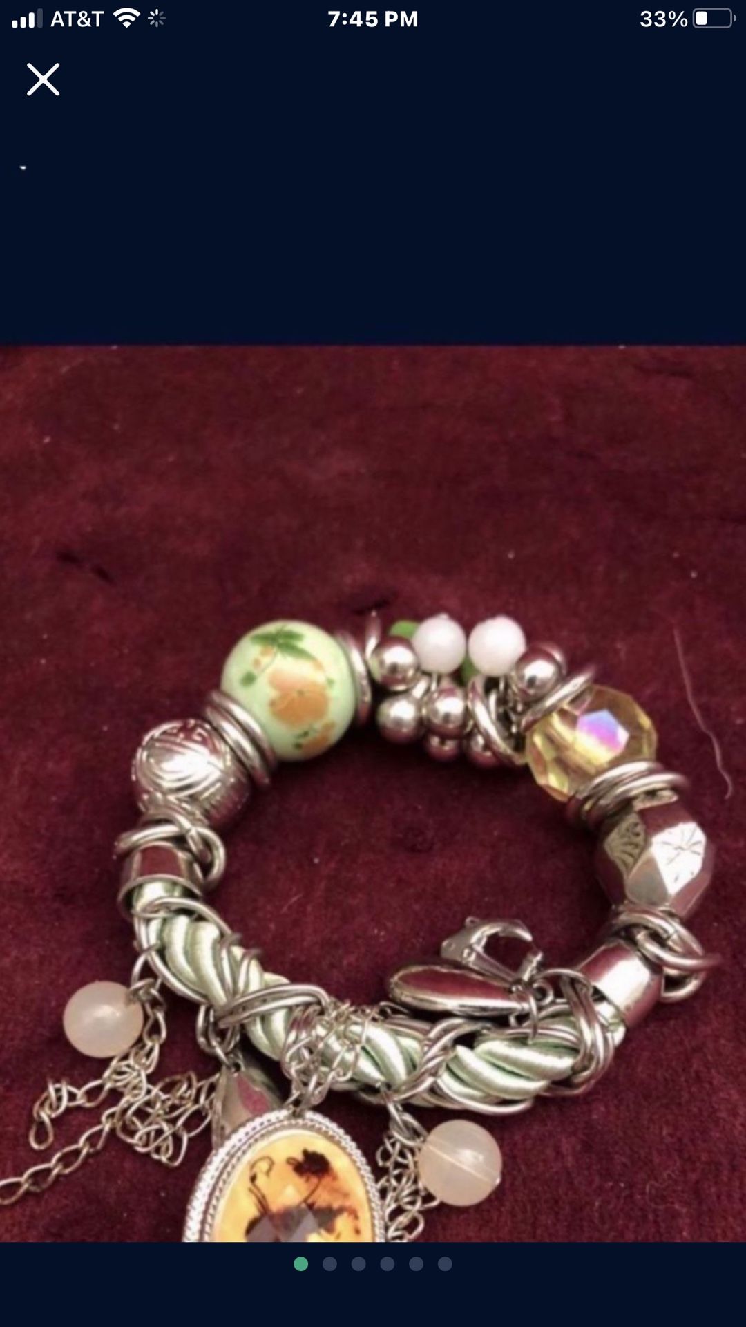 Expandable green bead charm bracelet