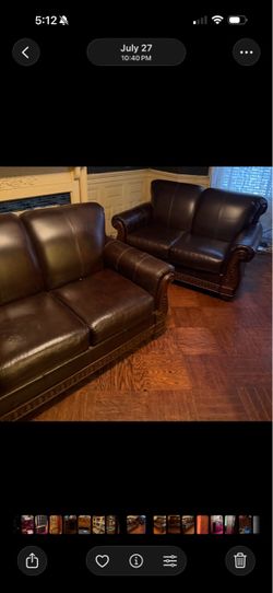Brown leather couch and love seat