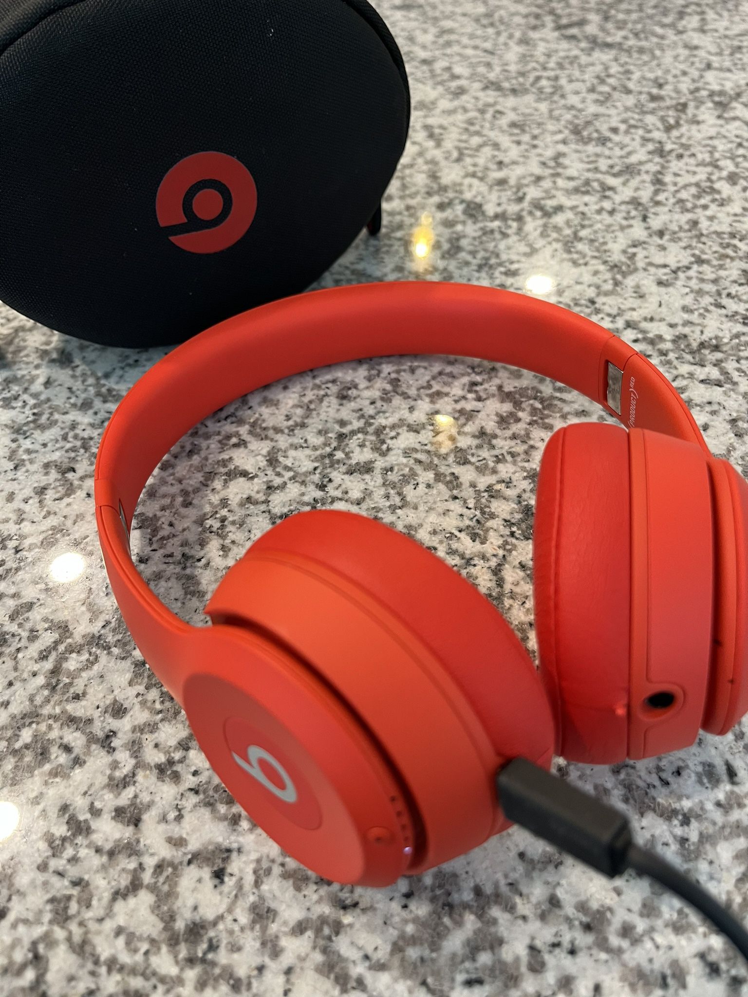 Beats Solo3 over ear product red headphones