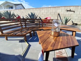 stunning vintage mid-century modern sectional sofa paired with coordinating wood coffee and side tables.