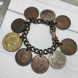 Vintage coin charm dangle gold tone bracelet from 1967