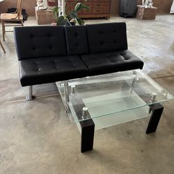 Black futon sofa bed & glass coffee table