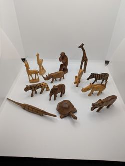 Lot 12 miniature carved wooden African Safari animals.