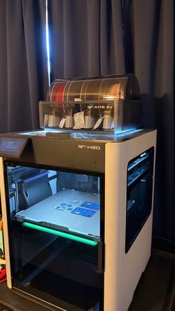 Bambu Lab H2D 3D printer with AMS