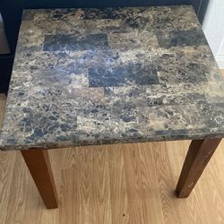 Dark granite side table