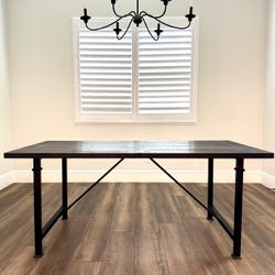 Pottery Barn Modern Farmhouse solid wood top dining table with metal legs. 