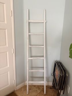 Indoor white ladder, distressed