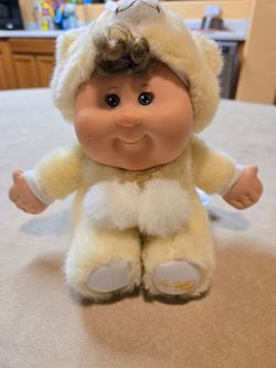 Tiny cabbage patch in bear outfit