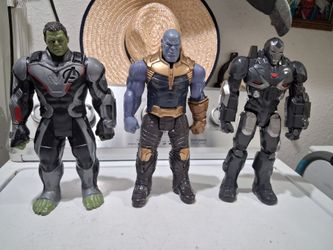 Action figures 12 inches..Marvel Endgame Hulk, Thanos Avengers, and Marvel War Machine.  good condition.