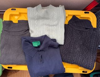 4 Women’s size medium sweaters