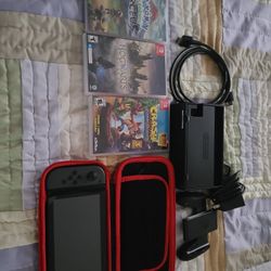 Nintendo Switch with Gray Joy-Cons and 3 Games
