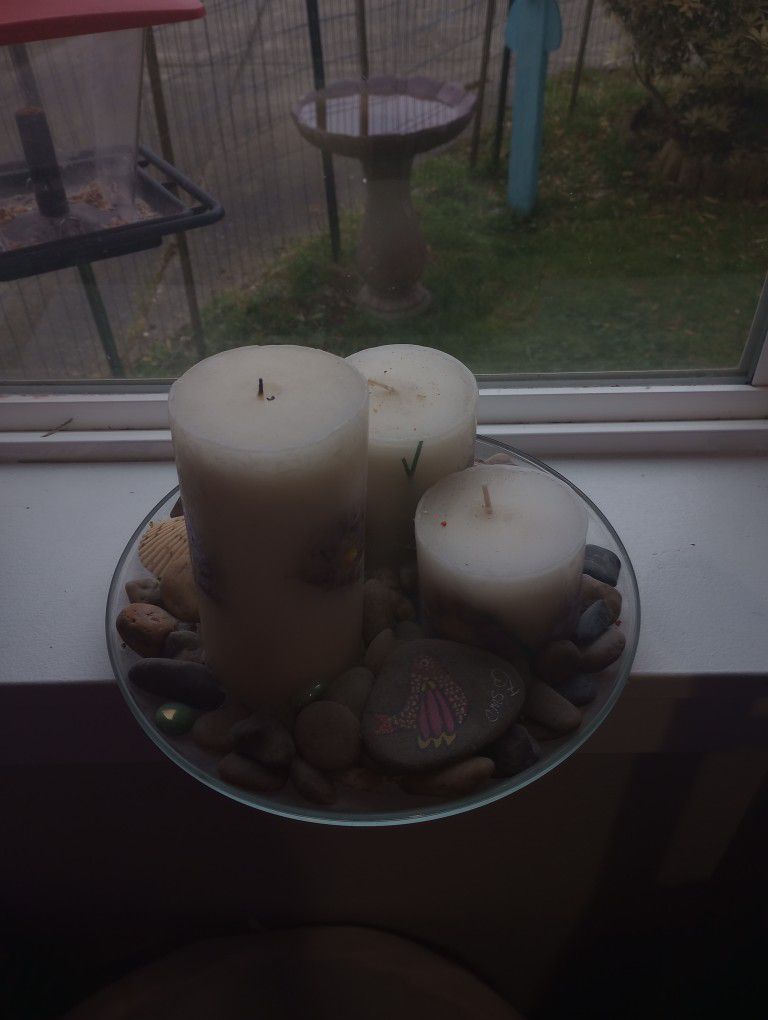 Floral Candle And Rock Decor