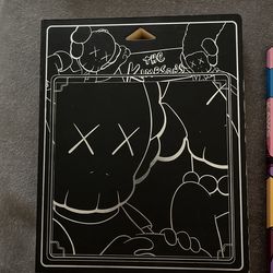 Kaws One And Kaws C10 Kimpsons Read Books