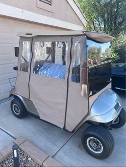 EZGO Golf Cart with Enclosure Cover