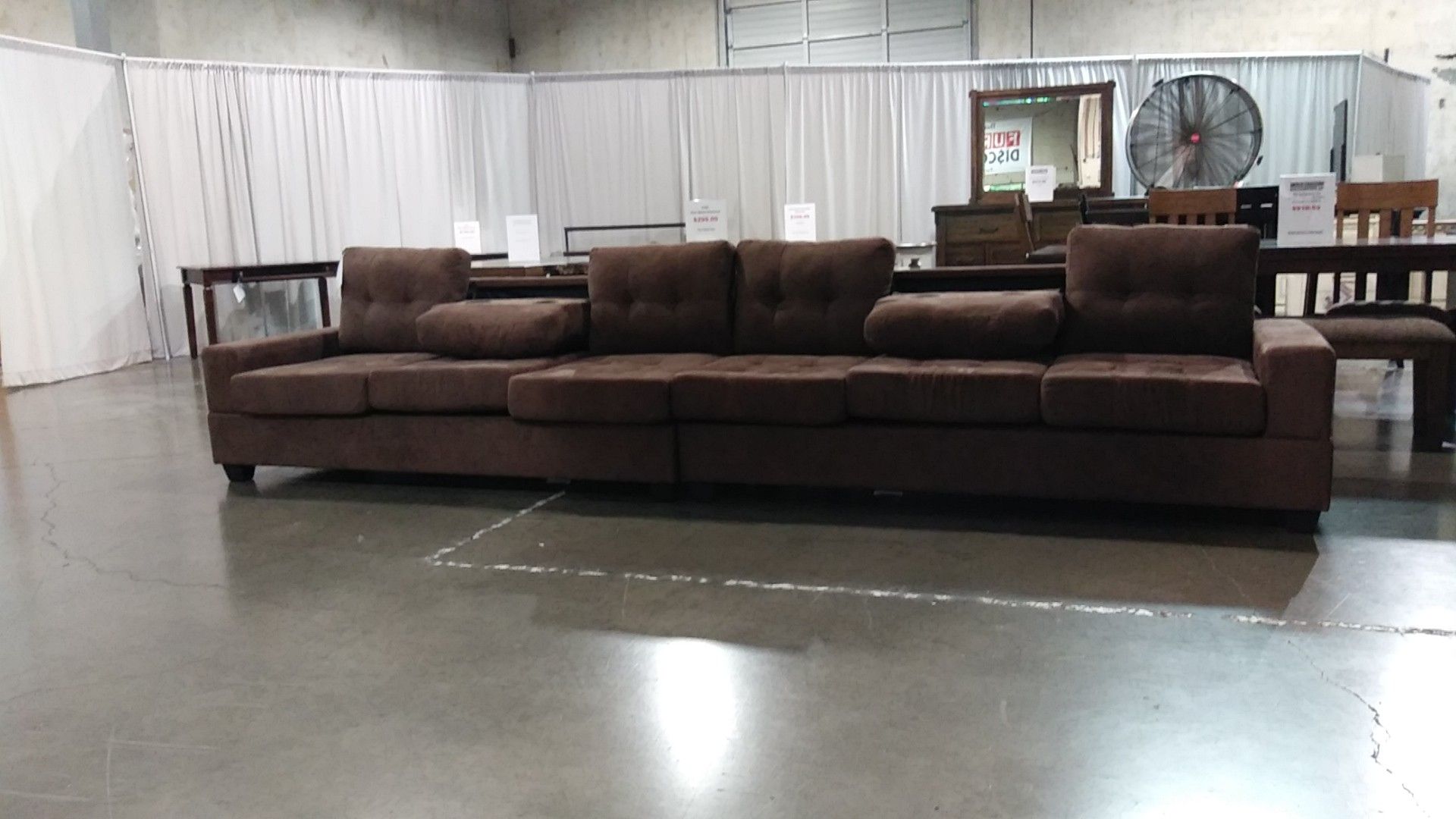 Brown Sectional with 2 consoles