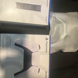Two Brand New PS5 Controllers And Charging Station