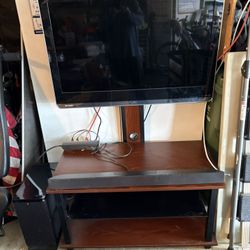 TV Stand With Surround Sound and TV