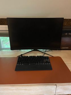 MSI monitor, keyboard, and headphones
